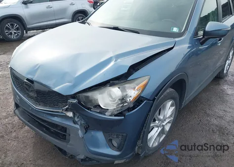 2015 Mazda Cx-5 Grand Touring z USA, uszkodzony, nr VIN JM3KE4DY4F0477984